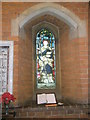 Stained glass window next to the war memorial at St Matthew