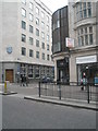 Crest on a building at the junction of Eastcheap and Pudding Lane