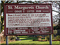 The ruined church of St Margaret - information board