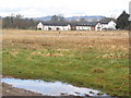 Looking across the fields, towards Bussells Farm