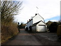 Cottages, on the narrow lane, from Ellerhayes bridge