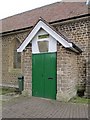 Green doors on the porch