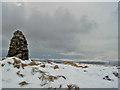 NG2461 : Memorial cairn on Ben Geary by Richard Dorrell