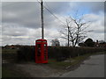 Seat by the phonebox opposite St James, Heyshott