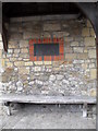 Memorial seat to a former incumbent outside Midhurst Parish Church