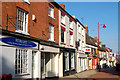 Daventry: sunlit shops in Sheaf Street