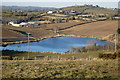 Small Lake surrounded by farmland