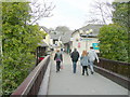 Crossing the footbridge