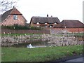 Pond and houses, Hamptworth