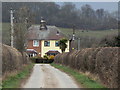 Yellow house at the end of the lane