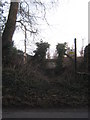 Steps and stile to a footpath on Harville Road.