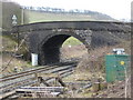 Railway bridge at entrance to Tarmac