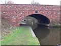 Canalboat approaching Calf Heath Bridge