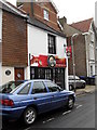 Peter Signs in Portland Road