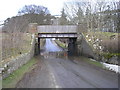 Flooded road under the Bowland railway bridge