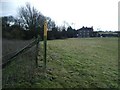 Footpath alongside former railway embankment, A5