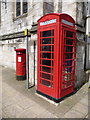 Dorchester: postbox № DT1 80 and phone, High West Street