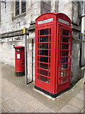 SY6990 : Dorchester: postbox № DT1 80 and phone, High West Street by Chris Downer
