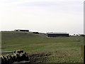 SE0223 : Barns on the side of Crow Hill, Sowerby seen from Long Edge Road by Michael Steele