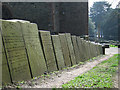 SJ2207 : Gravestone wall (2) by Dave Croker