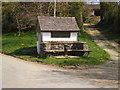 The village bus stop, and the old water pump in Picklescott