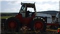 NZ0408 : Tractor at Barns, Far East Hope by Matthew Hatton