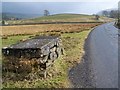 Milk churn stand near Crooks Bank