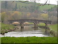 Halfpenny Bridge on the river Torridge as seen from upstream