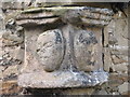 Mediaeval heads in the yard at the Wheatsheaf Hotel