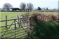 SH4036 : View across farmland towards Tyddyn Iol by Eric Jones