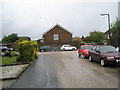 Approaching the junction of  Dankton Gardens and Rectory Farm Road