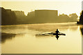 Early rower practises in the misty River Trent