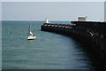 TQ3302 : Yacht Entering Brighton Marina, Sussex by Peter Trimming