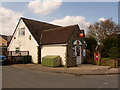 Keighley: Thwaites Brow Post Office and postbox № BD21 119