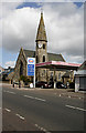 St Pauls Parish Church and Esso filling station at Forth