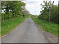 NT8853 : Minor road heading past Broomdykes by James Denham