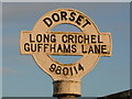 ST9811 : Long Crichel: detail of Guffhams Lane finger-post by Chris Downer