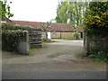 Gateway and farmyard at Heath End Farm