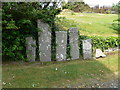 SH4468 : Inscribed stones at Llangaffo Church by Eirian Evans