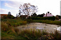 TG0934 : Pond, Edgefield, Norfolk by Christine Matthews