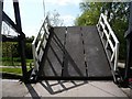 Raised lift bridge, allowing narrowboat through