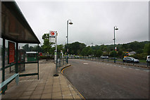 TQ3763 : Bus Stop & Tram Station by John Salmon