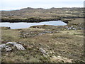 NM6663 : Lochan near Druim a' Bhealaich by Chris Wimbush