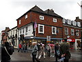 A busy scene at the junction of Crane and High Streets