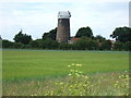 TF7041 : Mill tower north of Ringstead by Richard Humphrey