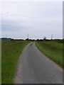 TM3597 : Road to Bush Farm by Glen Denny