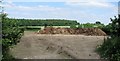 Manure heap in field