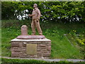 NX9914 : Statue to commemorate Wainwright's Coast to Coast Walk by Phil Catterall