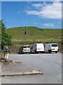 Car park  and an old petrol pump off the A499 at Llanaelhaearn