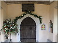 Sign inside pourch of St John the Baptist Church, Mount Bures